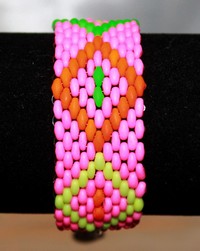 Bracelet tissé main fluo rose/vert/orange/jaune